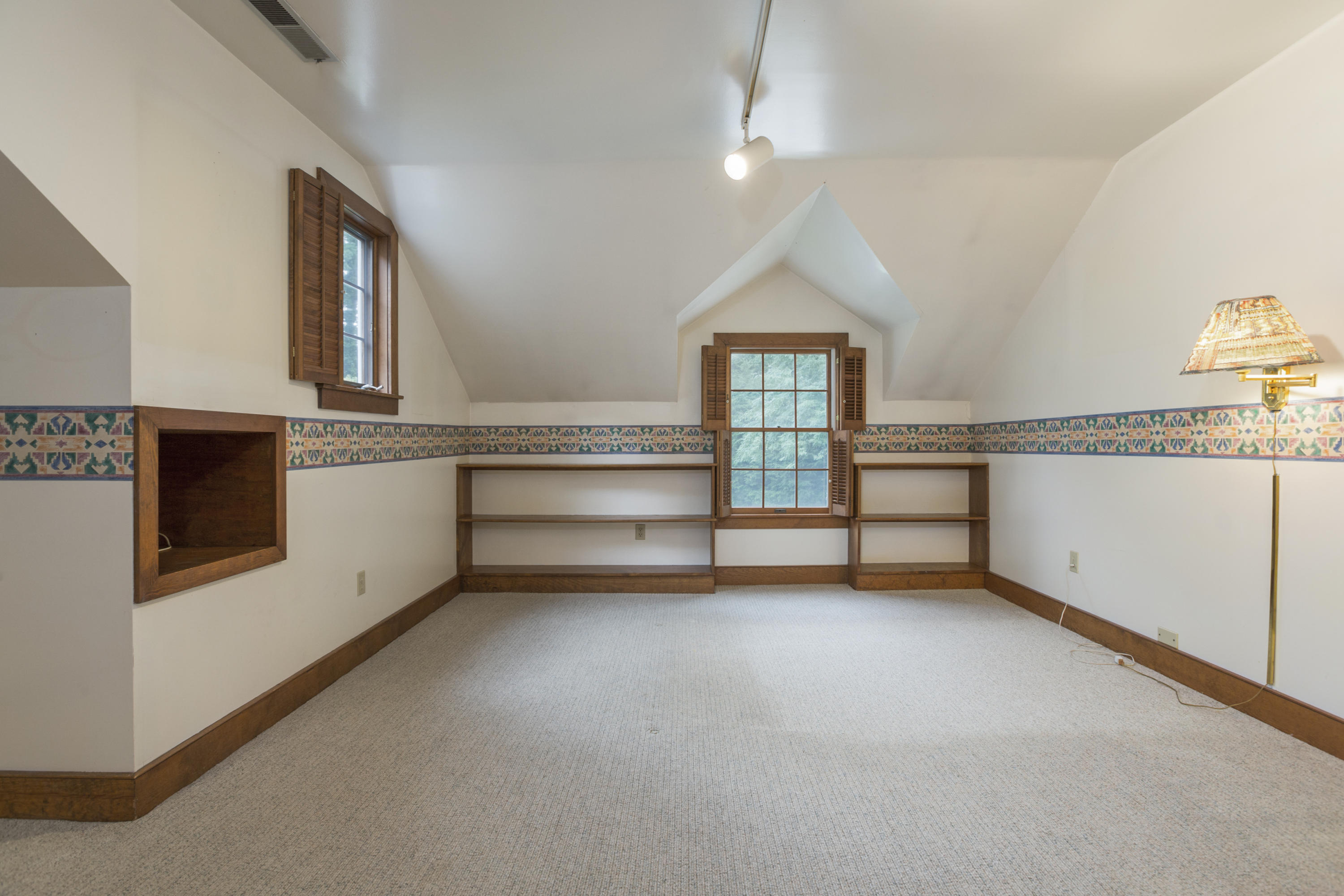 283 Hollow Tree Ridge Road Darien, CT 06820 - Photo 29 of 49 a view of a kitchen with furniture and a fireplace