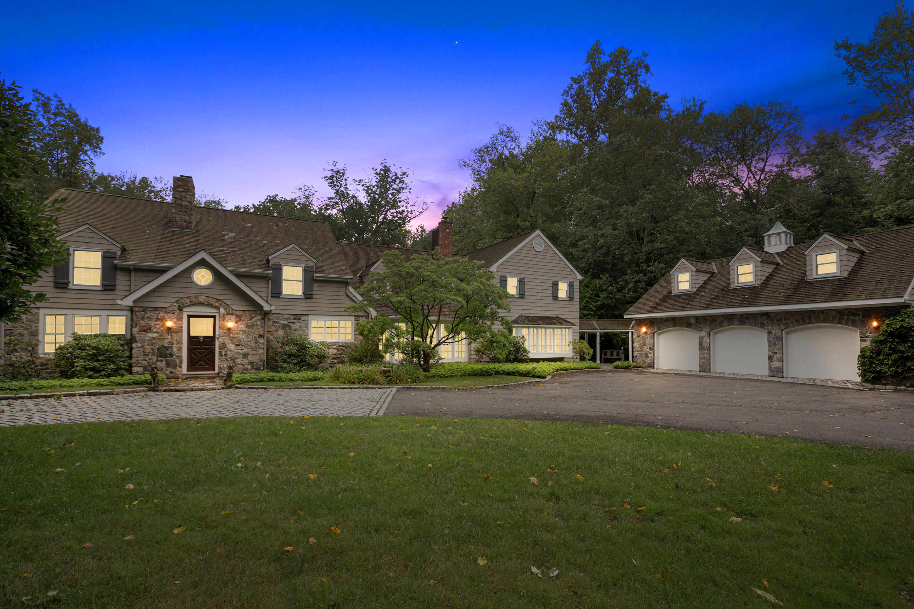 283 Hollow Tree Ridge Road Darien, CT 06820 - Photo 47 of 49 front view of a house with a yard