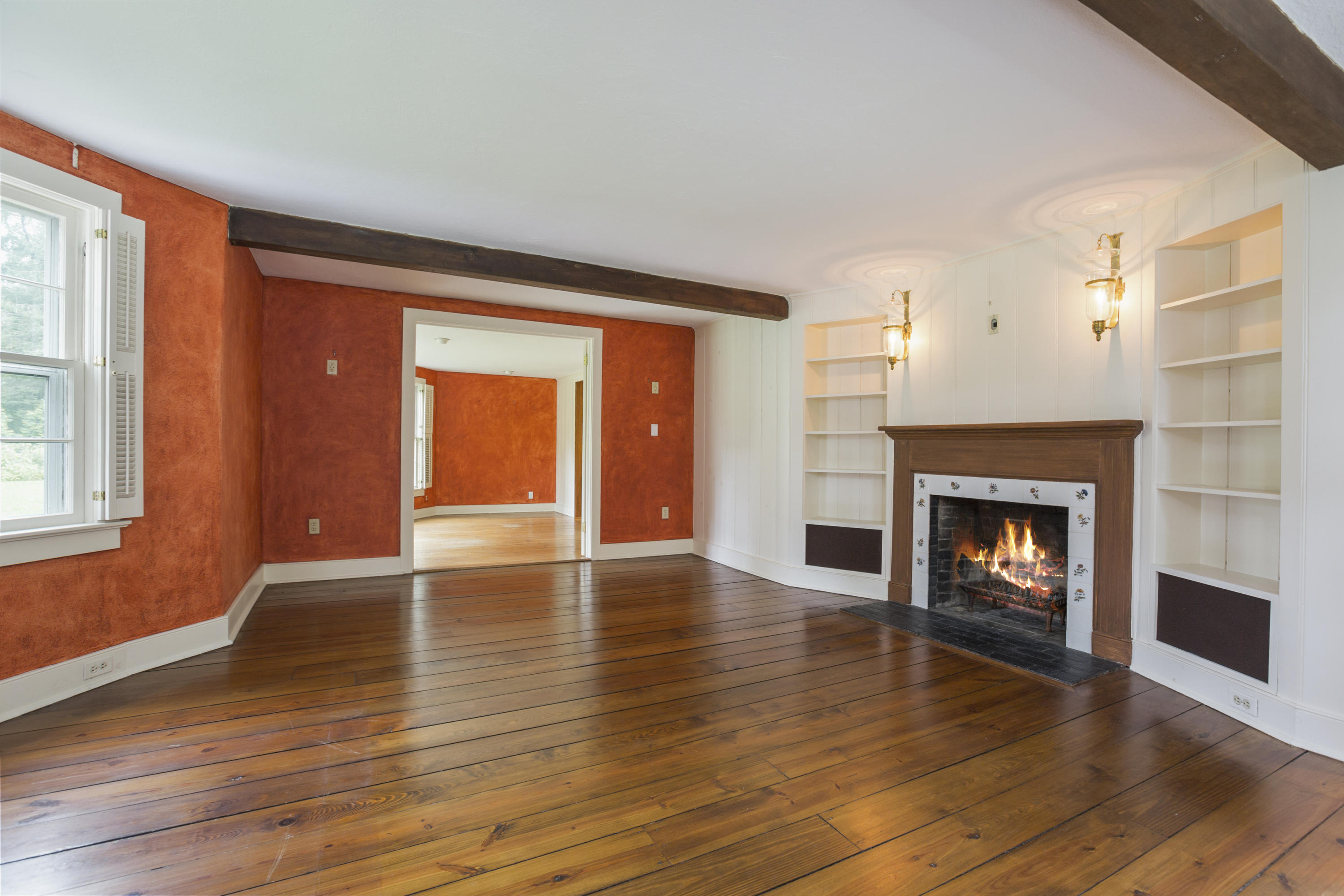 283 Hollow Tree Ridge Road Darien, CT 06820 - Photo 7 of 49 a view of an empty room with window and fire place