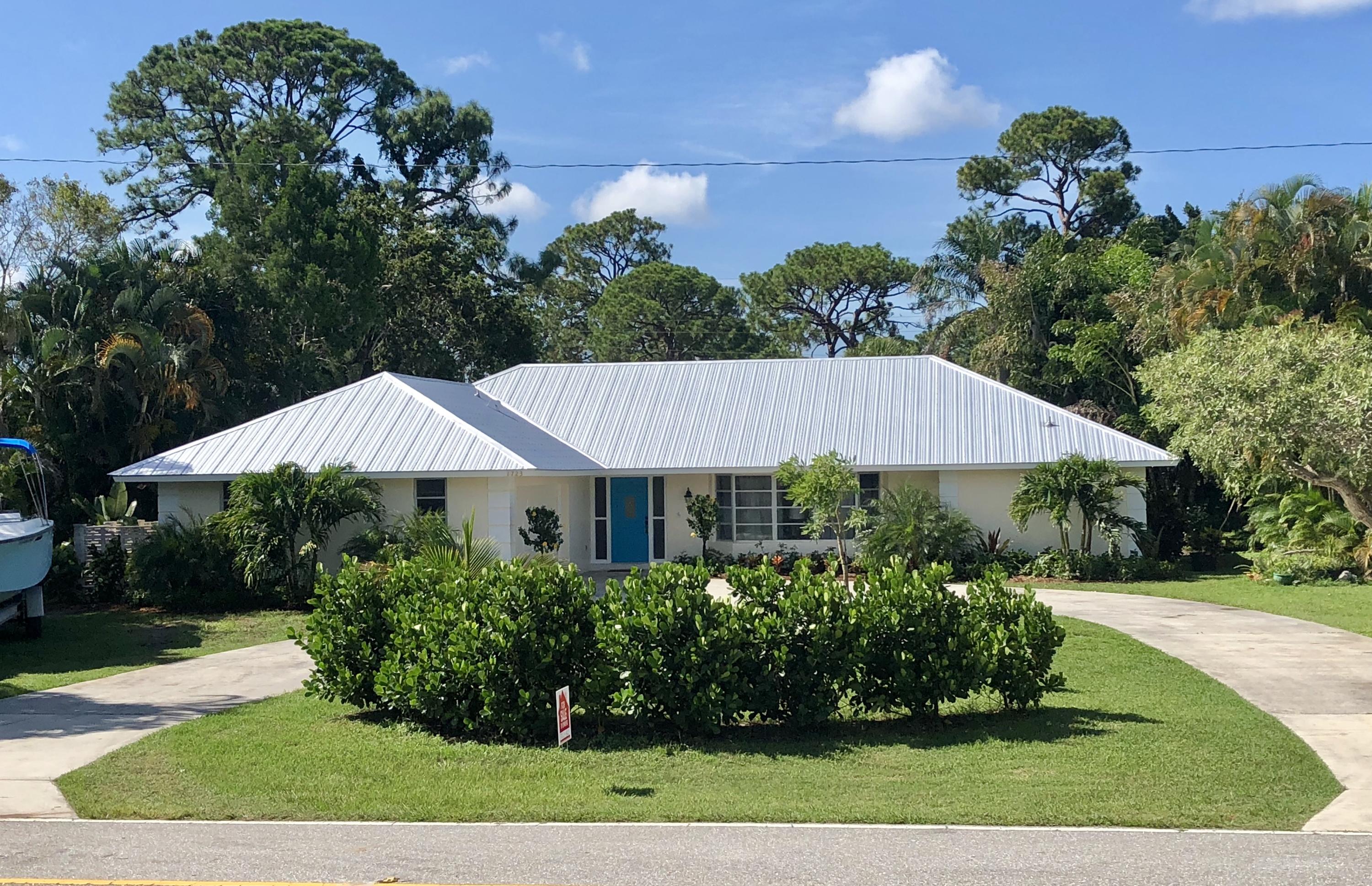 1723 Northwest Spruce Ridge Drive Stuart, FL 34994 - Photo 1 of 27 fullsizeoutput_3fd1