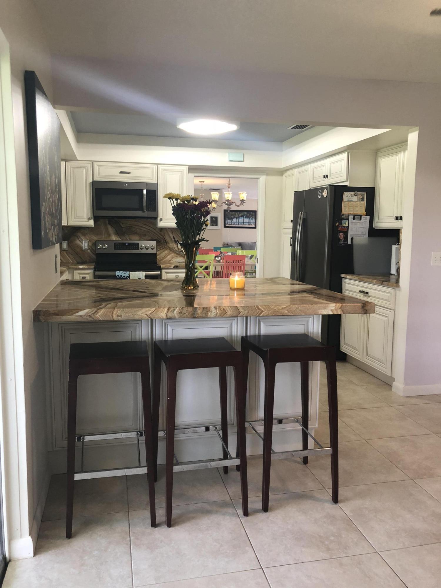 1723 Northwest Spruce Ridge Drive Stuart, FL 34994 - Photo 8 of 27 FDhRCqTnTB6AiEaiT2bmTKQ