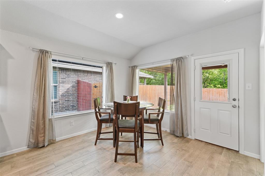 9020 Ridgeriver Way Fort Worth, TX 76131 - Photo 13 of 26 a view of a dining room with furniture and a window
