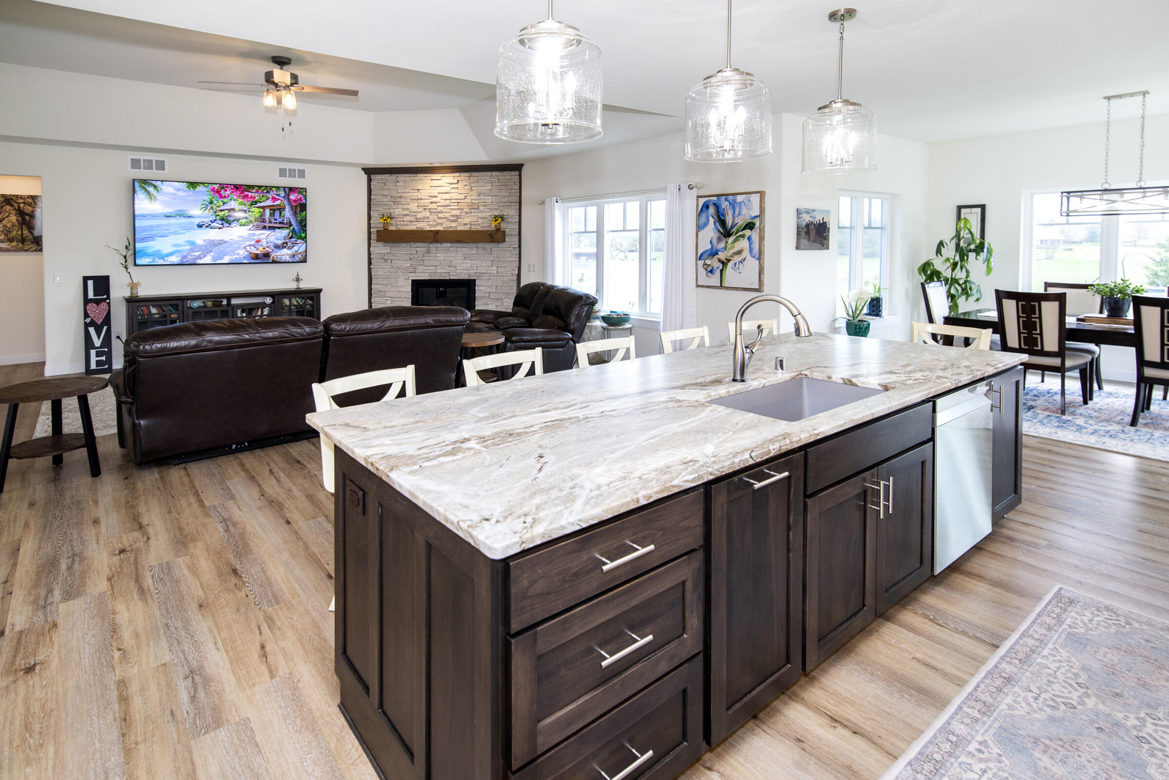 638 Red Oak Drive Summit, WI 53066 - Photo 15 of 49 Kitchen Island and Family room View