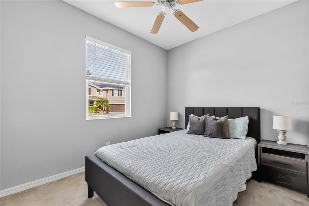 4368 Moon Shadow Loop Mulberry, FL 33860 - Photo 29 of 39 a bedroom with a bed and window