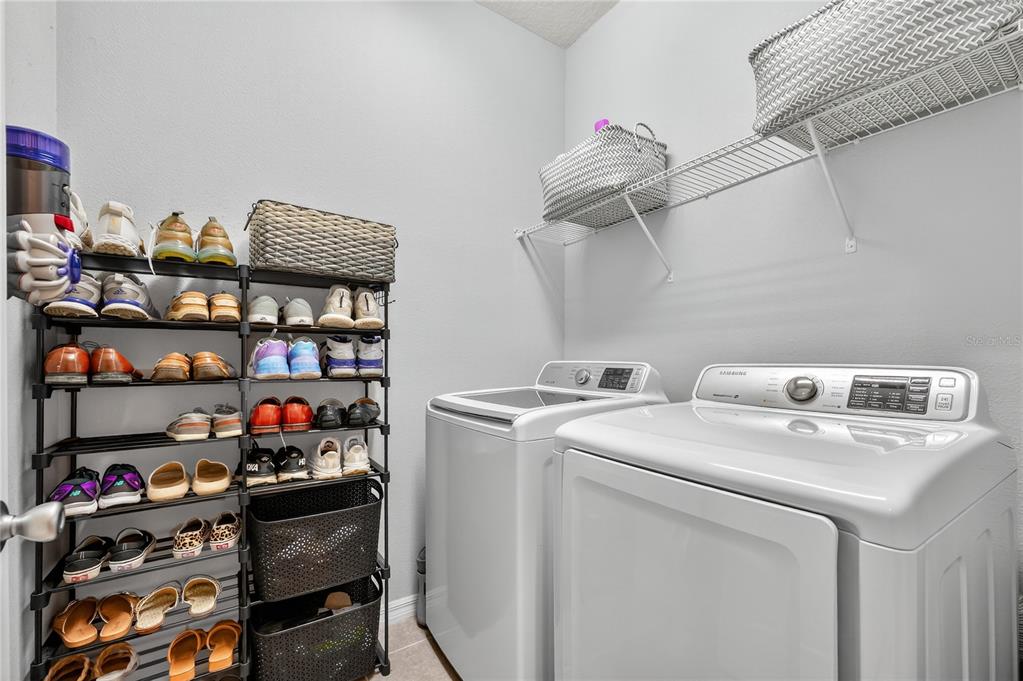 4368 Moon Shadow Loop Mulberry, FL 33860 - Photo 32 of 39 a room with storage and utility