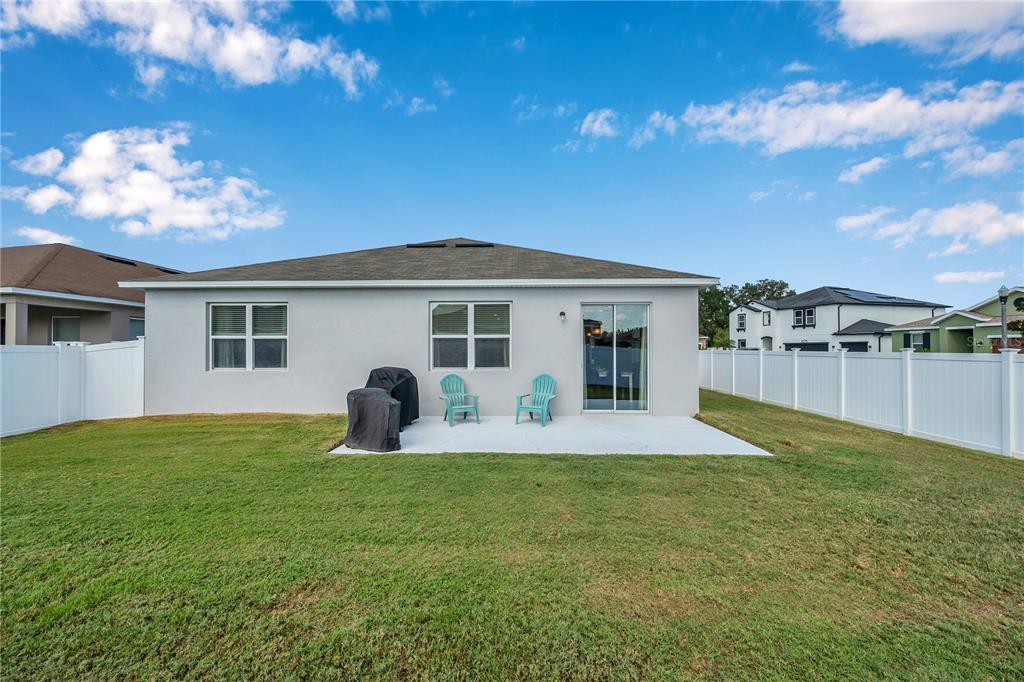 4368 Moon Shadow Loop Mulberry, FL 33860 - Photo 37 of 39 a house view with a garden space