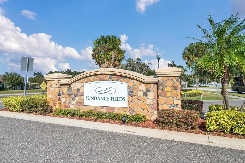 4368 Moon Shadow Loop Mulberry, FL 33860 - Photo 39 of 39 a sign on the side of a building