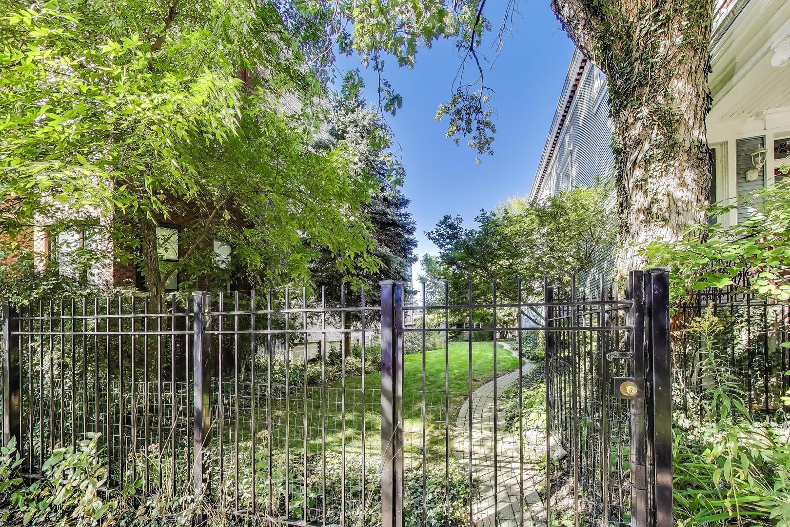 2524 West Winnemac Avenue Chicago, IL 60625 - Photo 1 of 16 a view of a garden