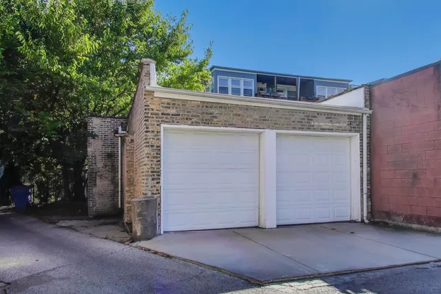 a view of a house with a tree