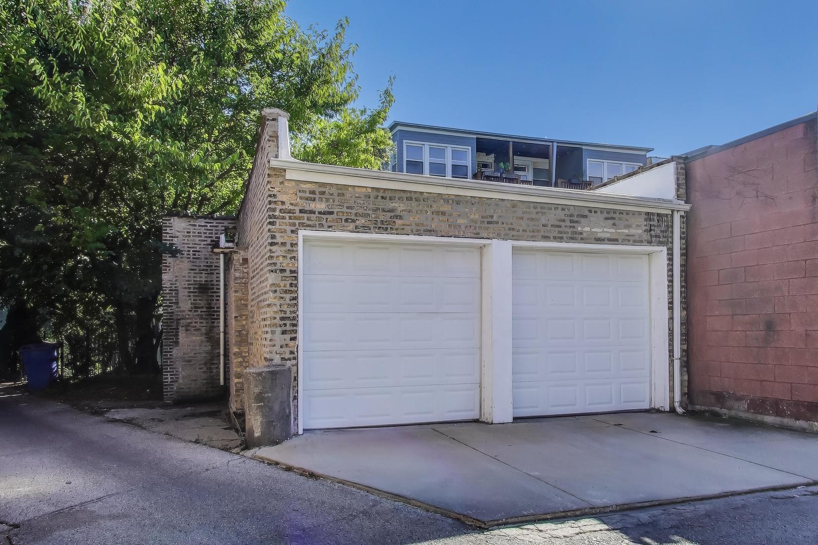 2524 West Winnemac Avenue Chicago, IL 60625 - Photo 5 of 16 a view of a house with a tree