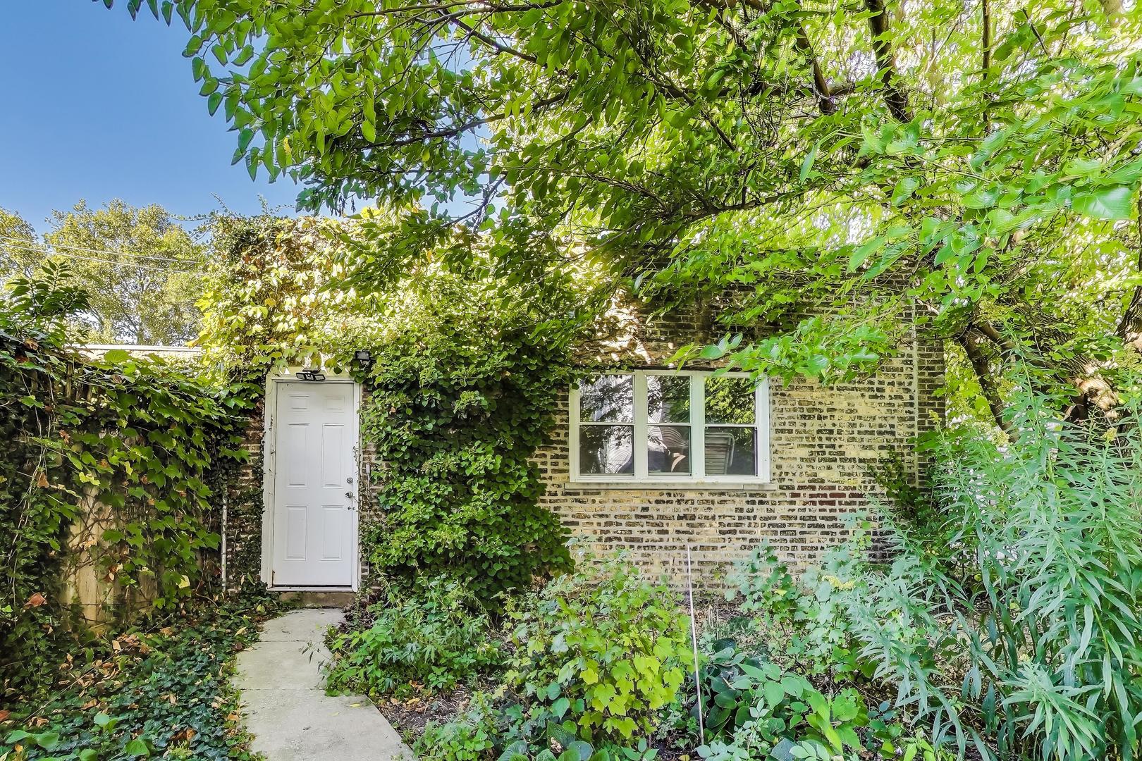2524 West Winnemac Avenue Chicago, IL 60625 - Photo 7 of 16 front view of a house with a tree