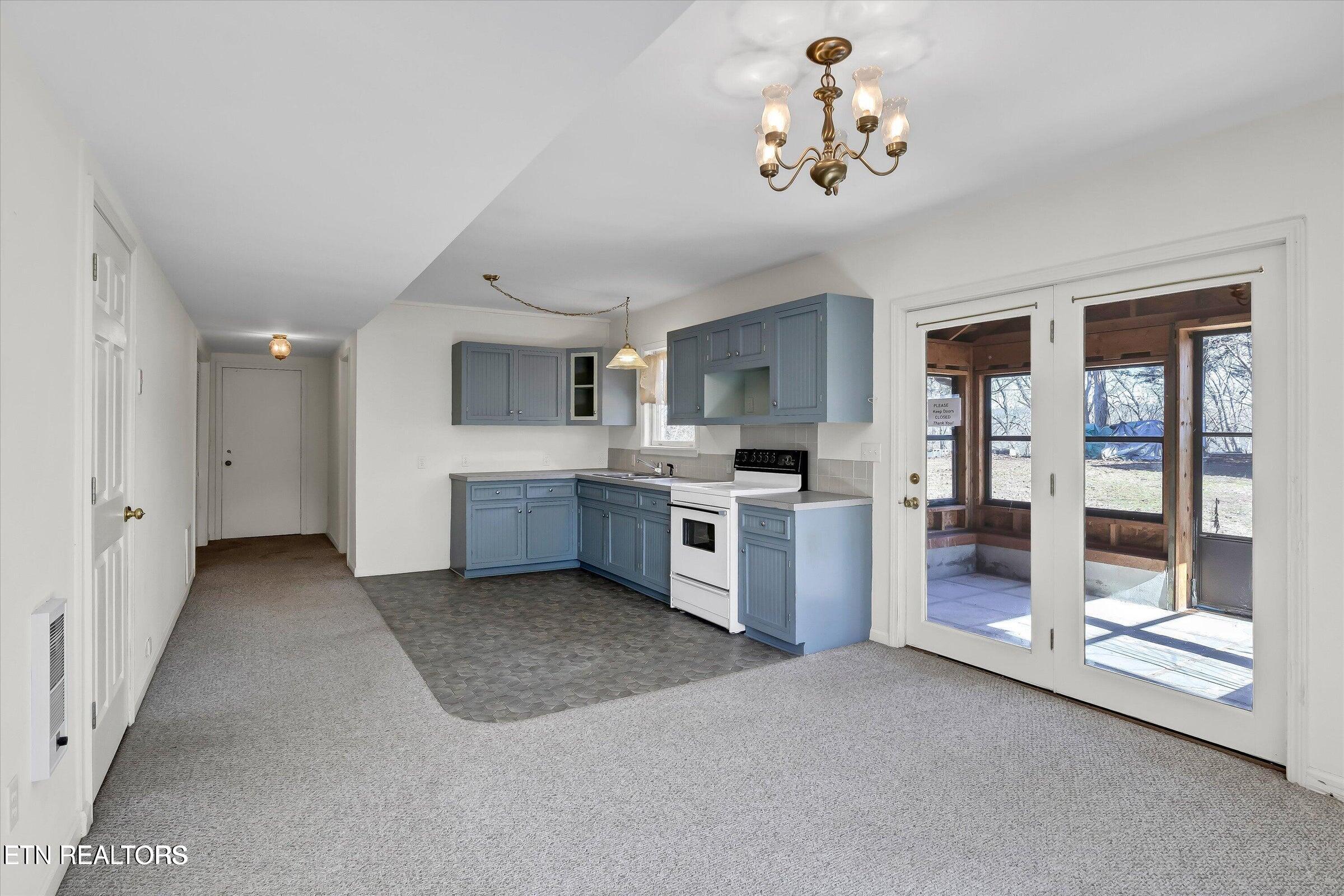 422 Crosby Drive Bean Station, TN 37708 - Photo 29 of 45 GROUND LEVEL KITCHEN SUN PORCH