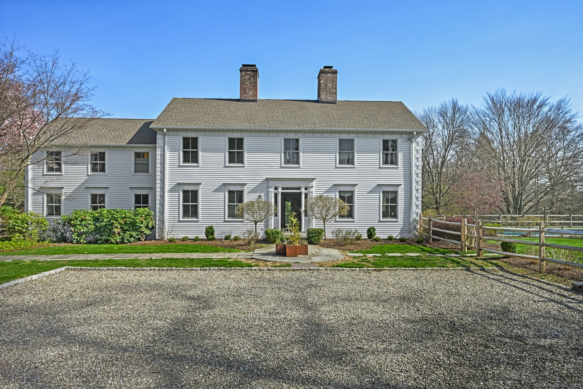 43 Hickory Lane Fairfield, CT 06824 - Photo 1 of 1 a front view of a house with a yard