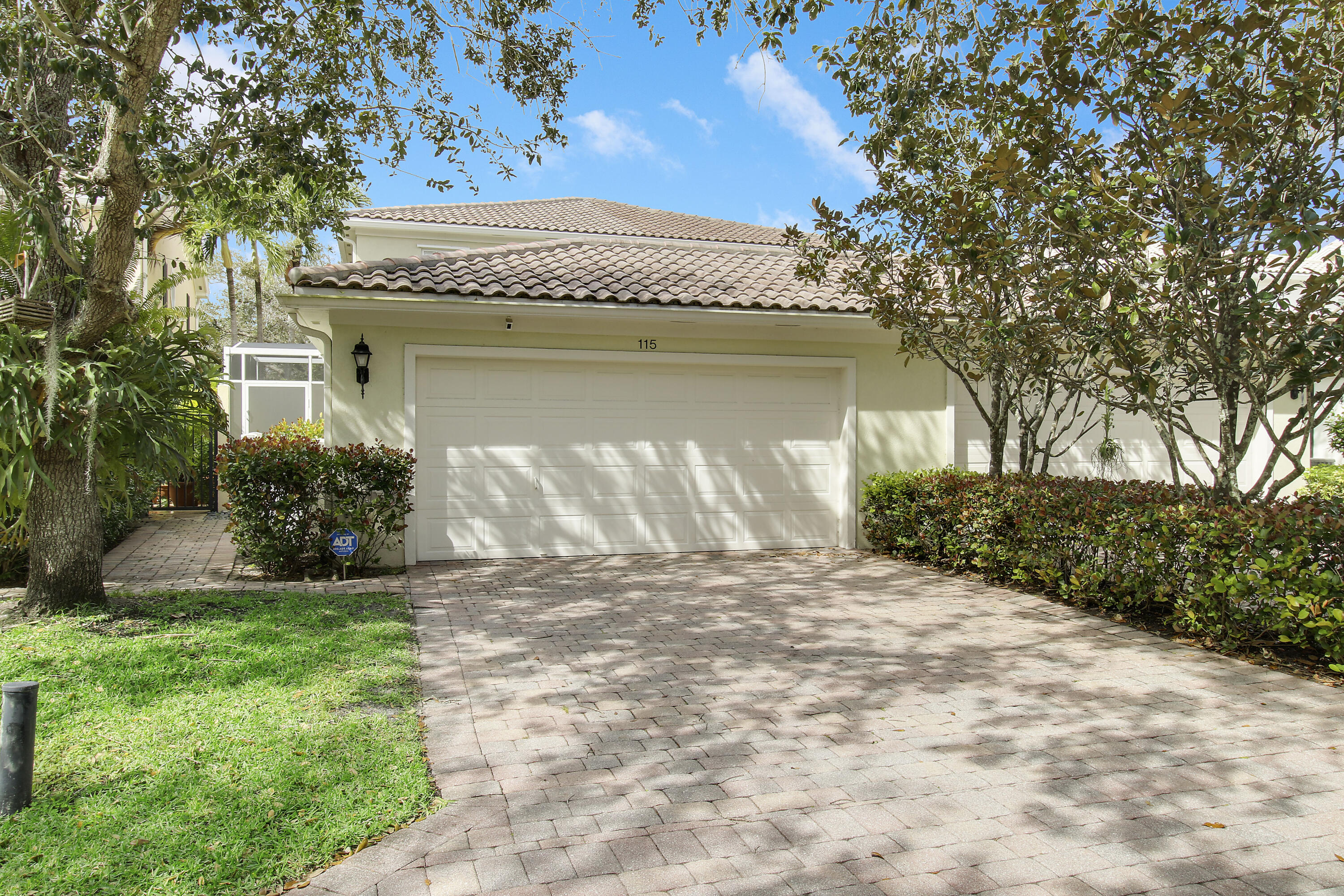 115 Rivinia Drive Jupiter, FL 33458 - Photo 32 of 42 2 car garage