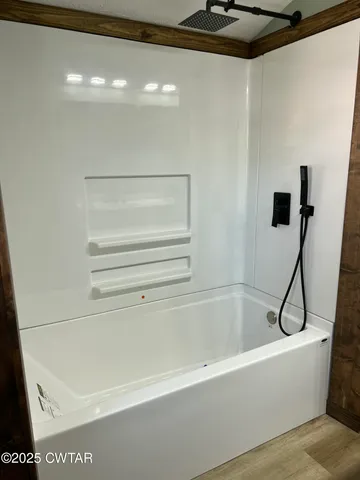 a bathroom with a bathtub