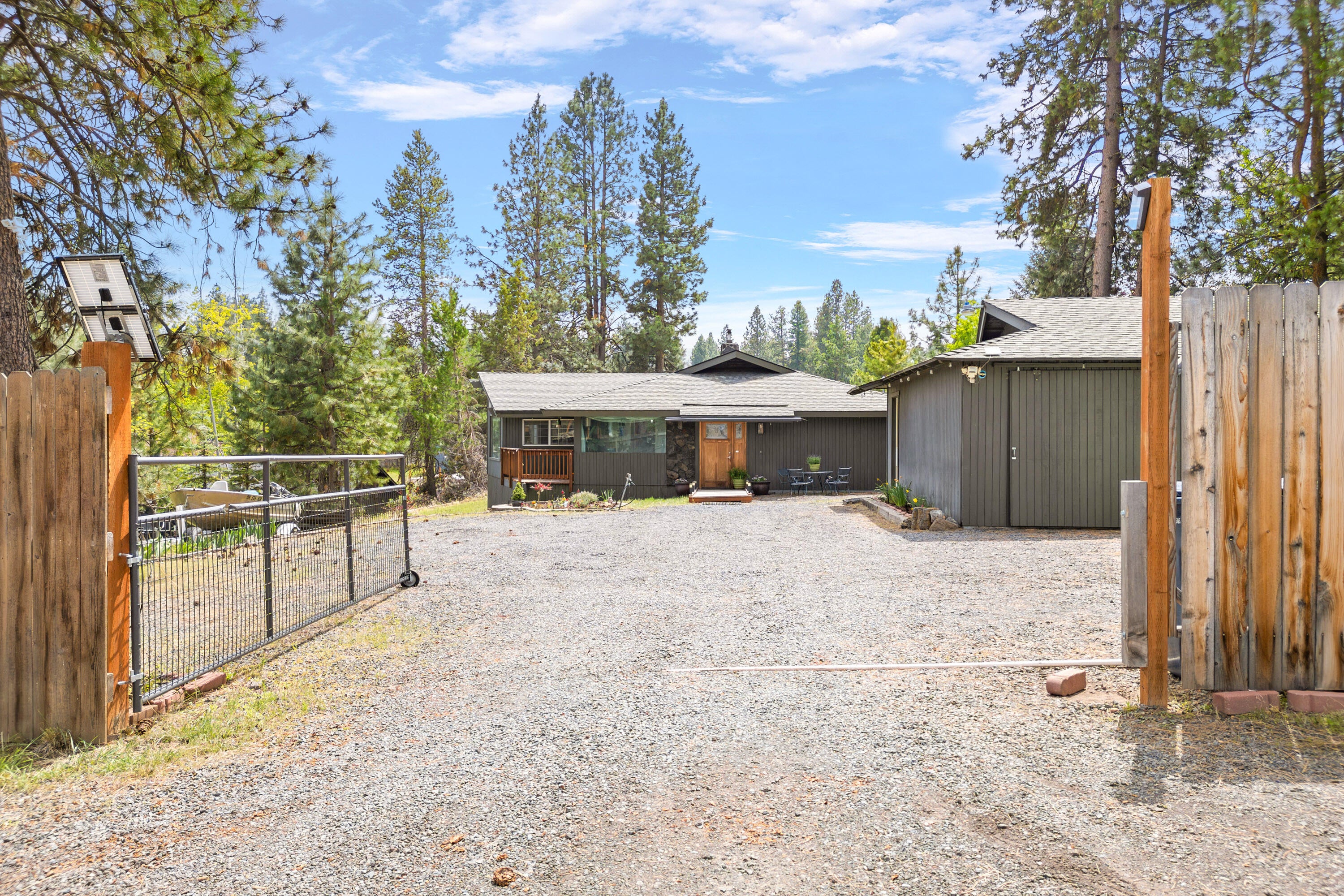 19143 Pumice Butte Road Bend, OR 97702 - Photo 12 of 19 Fenced front yard, with RV parking