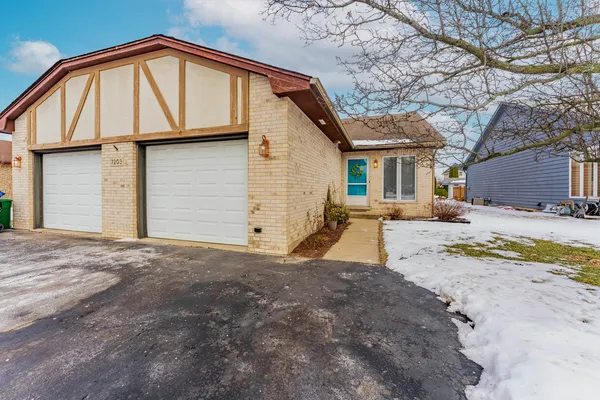 a view of a house with a snow in it