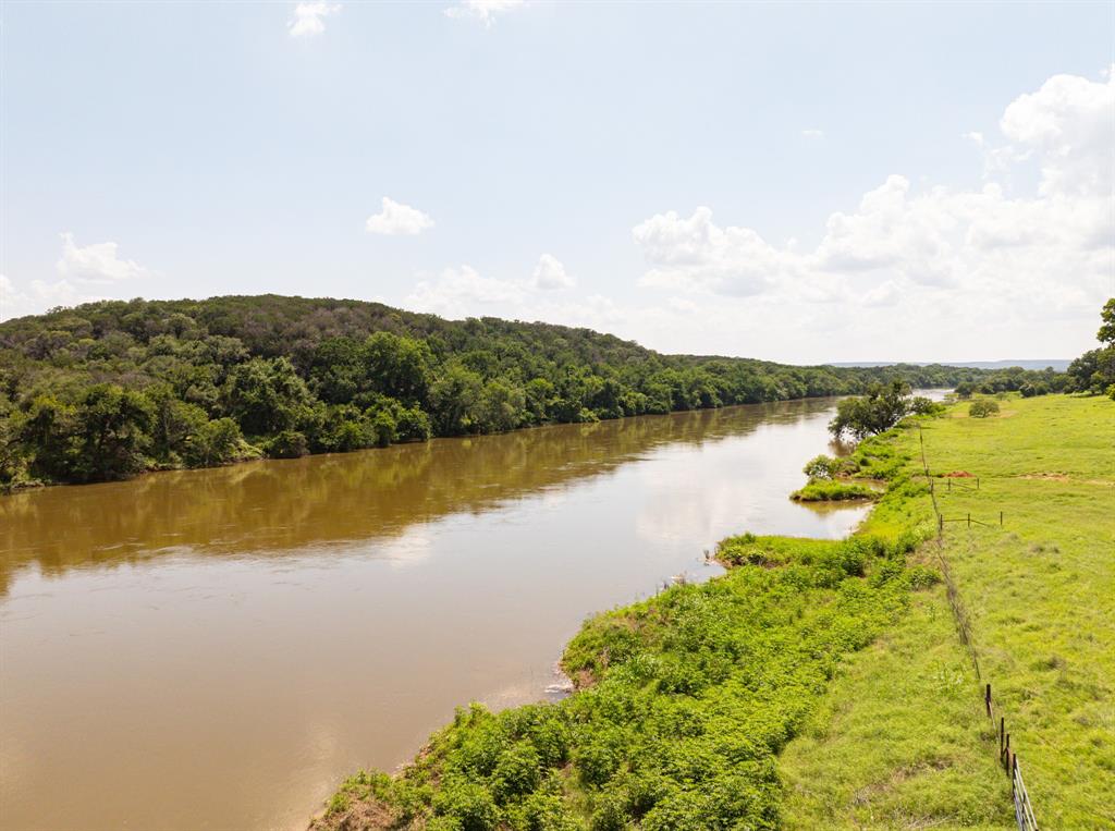 2105 River Shls Road Mineral Wells, TX 76067 - Photo 11 of 38 a view of a lake with a mountain in the background