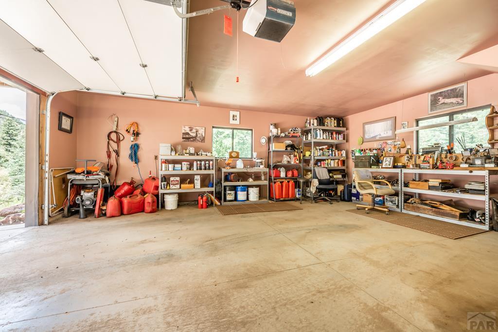 9600 Middle Creek Canyon Road Beulah, CO 81023 - Photo 45 of 50 a view of a garage with equipment