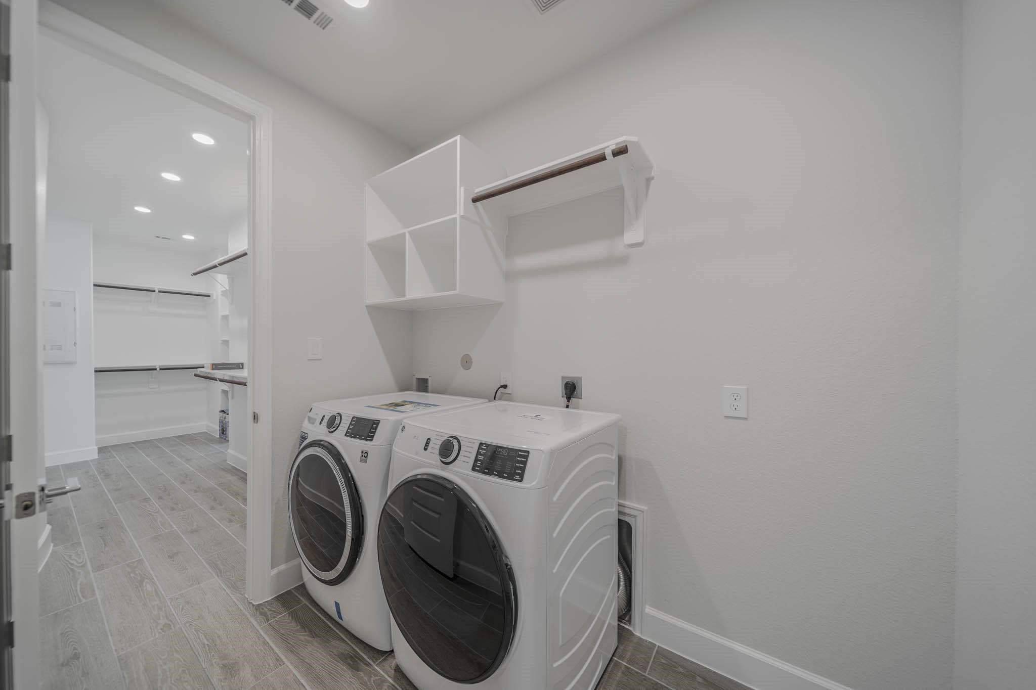29103 Hauter Way Fulshear, TX 77441 - Photo 13 of 40 a utility room with dryer and washer