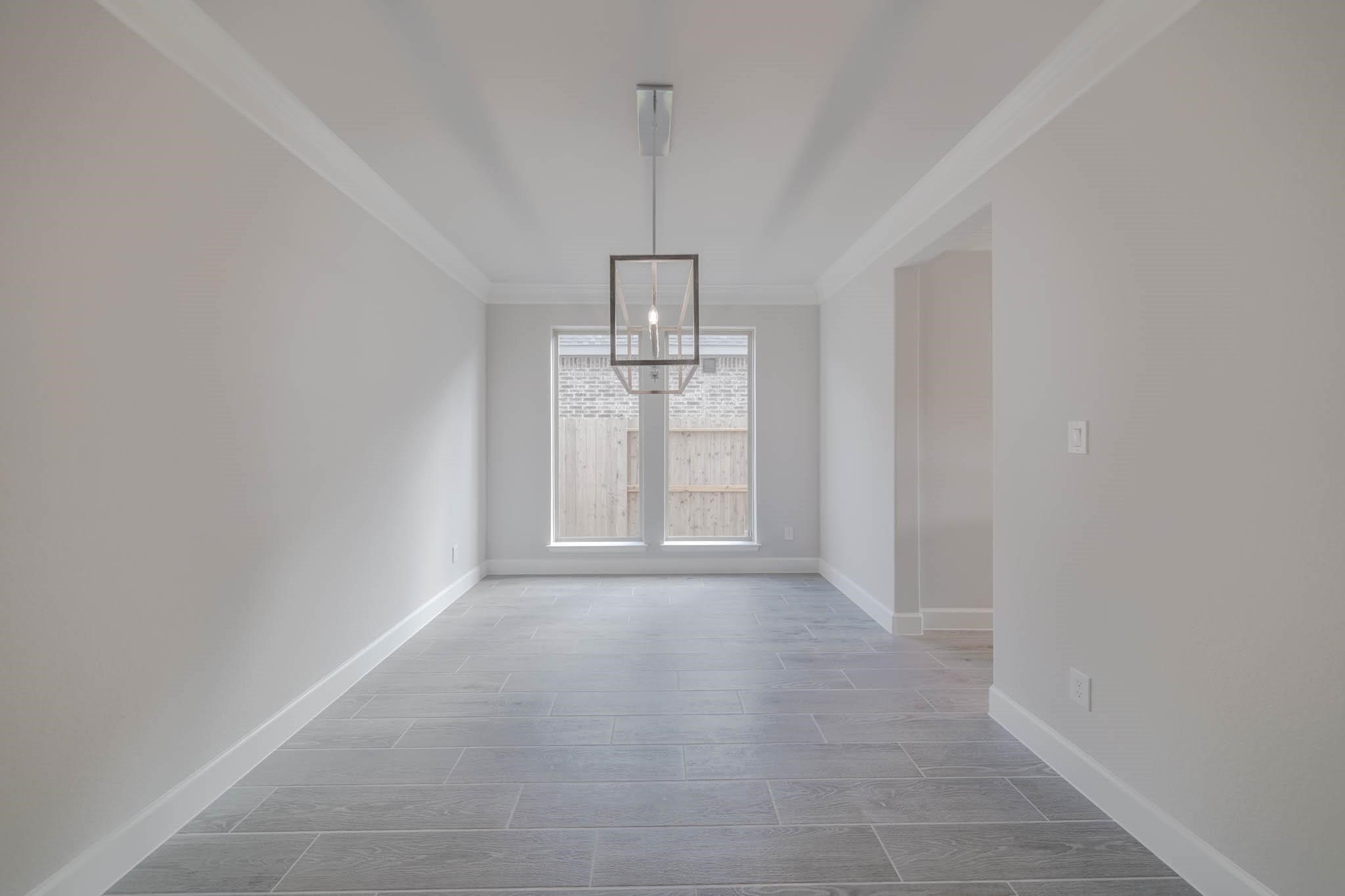 29103 Hauter Way Fulshear, TX 77441 - Photo 15 of 40 a view of empty room with window