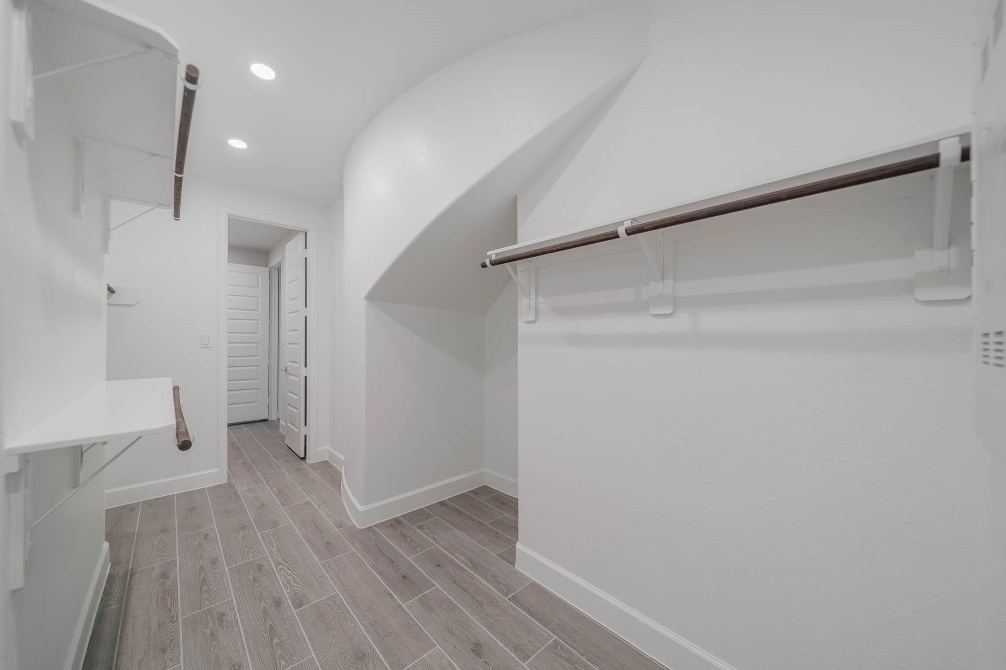 29103 Hauter Way Fulshear, TX 77441 - Photo 27 of 40 a view of entryway with wooden floor