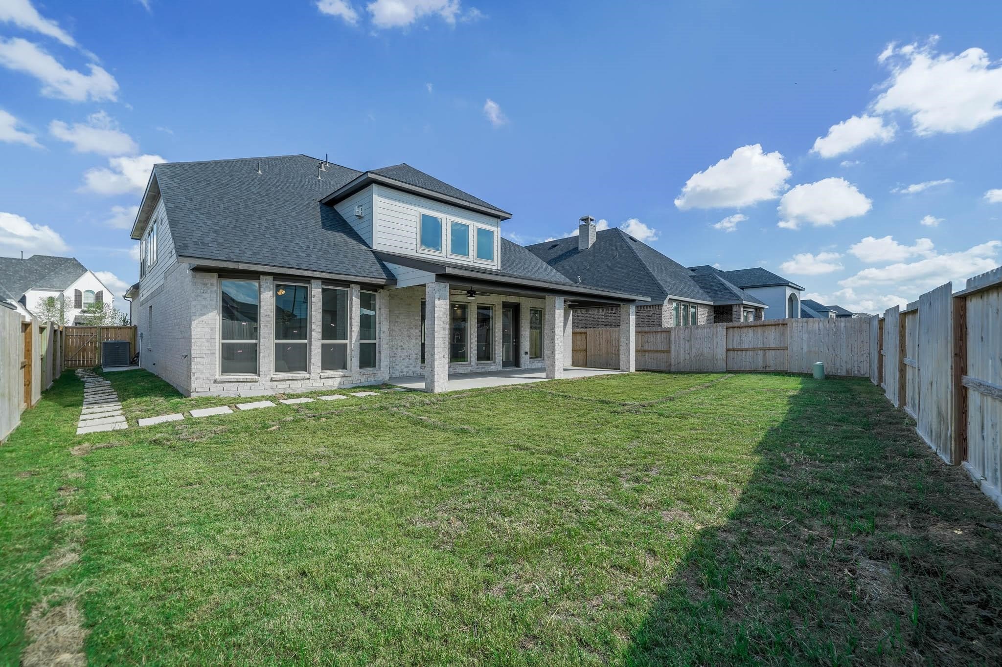29103 Hauter Way Fulshear, TX 77441 - Photo 39 of 40 a view of a house with a backyard