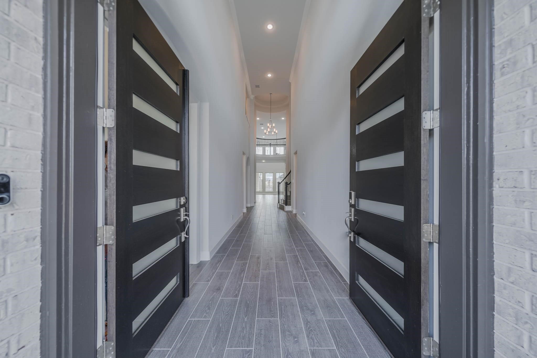 29103 Hauter Way Fulshear, TX 77441 - Photo 5 of 40 a view of closet area with empty racks