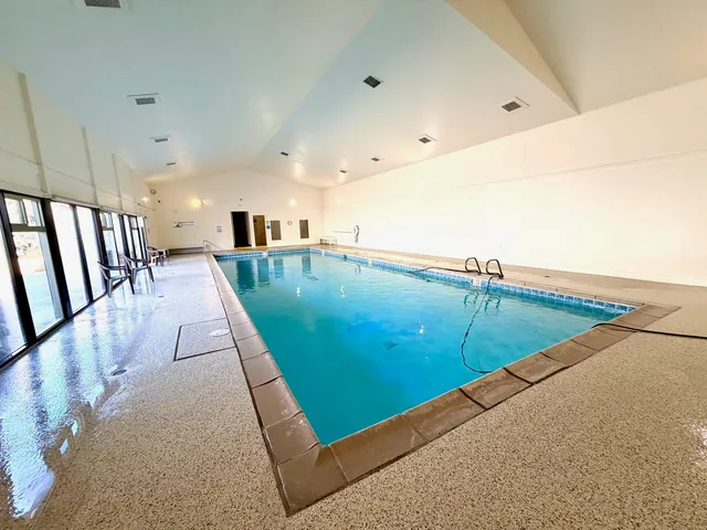 a view of a kitchen with kitchen island