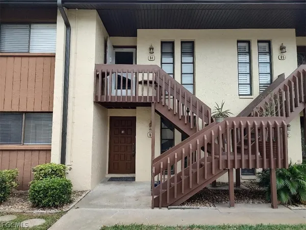 a view of balcony with deck and wooden floor