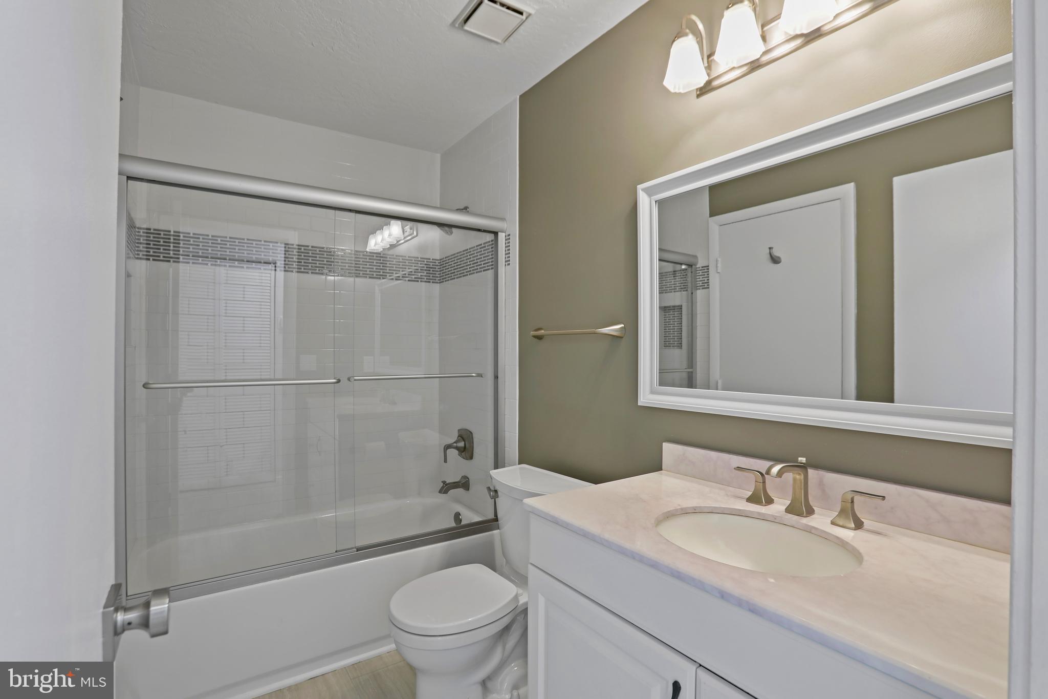 11737 Summerchase Circle Reston, VA 20194 - Photo 11 of 29 New Luxury Vinyl Tile in Bathroom