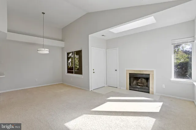a view of kitchen with cabinets