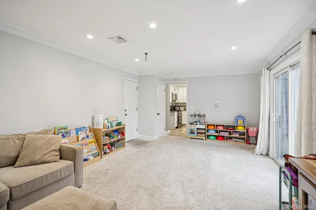 a bedroom with furniture and a couch