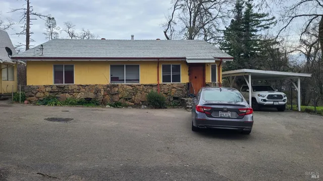 a car parked in front of a house