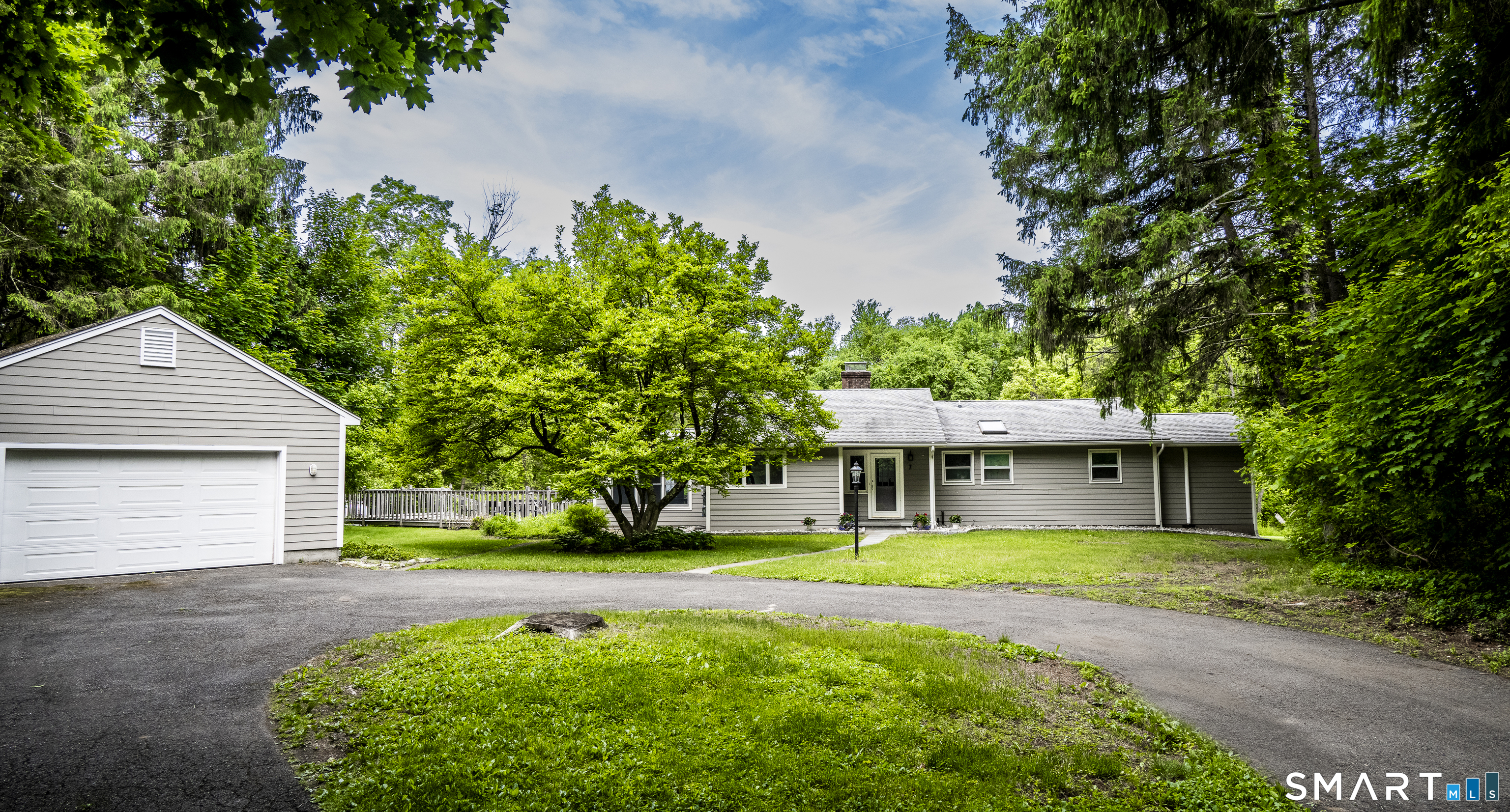 7 Chimney Rock Road Kent, CT 06757 - Photo 4 of 35 a front view of a house with a yard