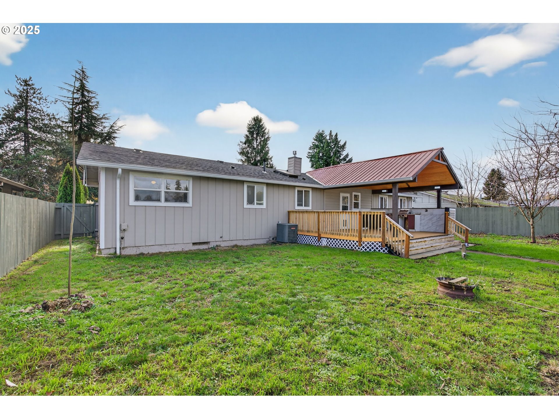 1100 South Ivy Street Cornelius, OR 97113 - Photo 32 of 36 a backyard of a house with table and chairs