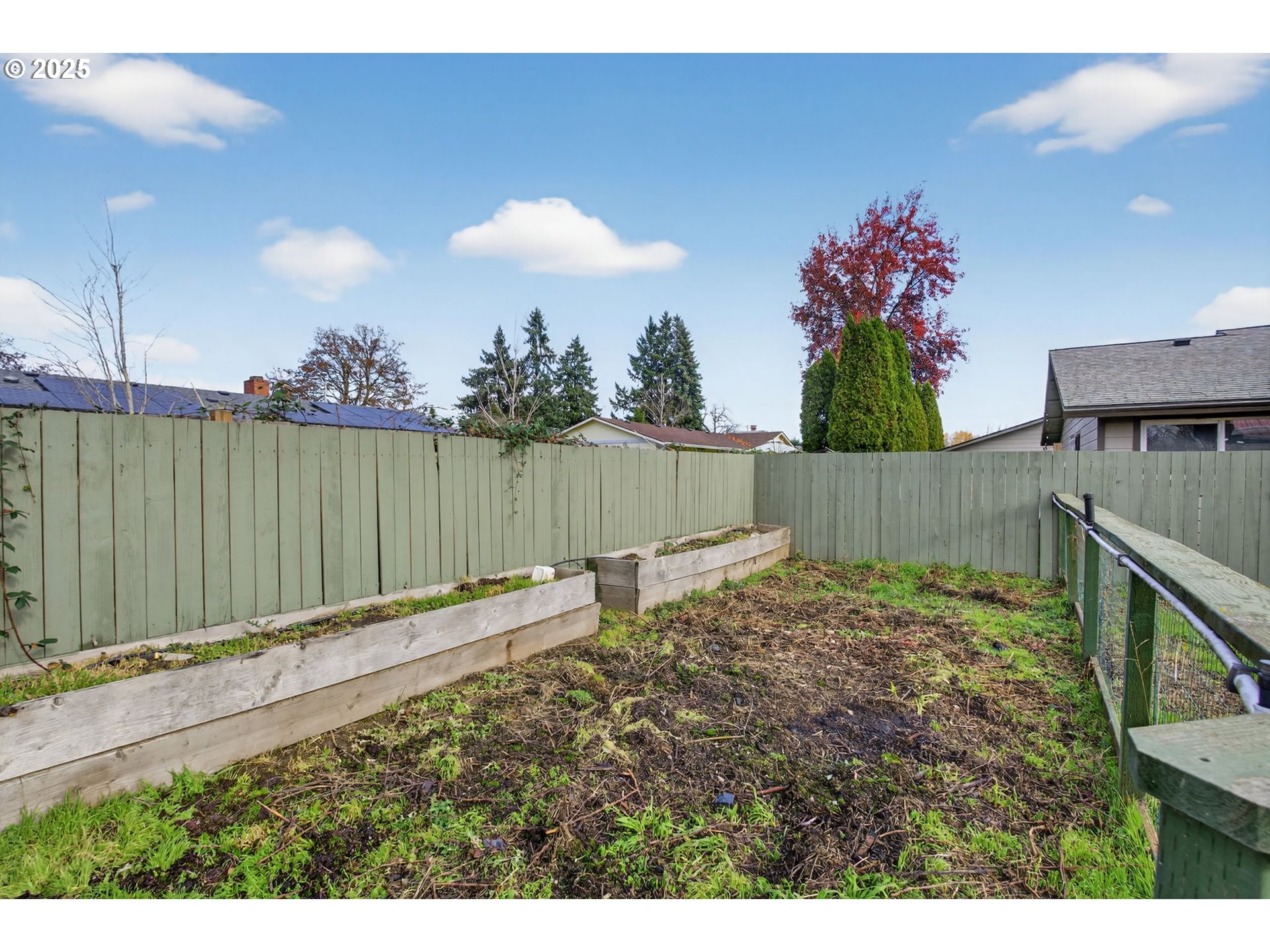 1100 South Ivy Street Cornelius, OR 97113 - Photo 33 of 36 a view of a backyard with a table and chair and potted plants