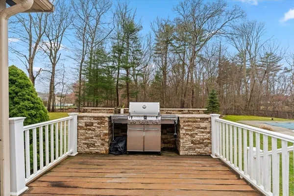 a view of a deck with trees