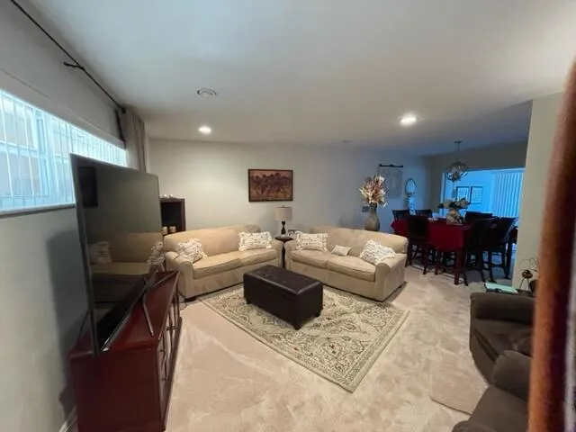 a living room with furniture and a couch