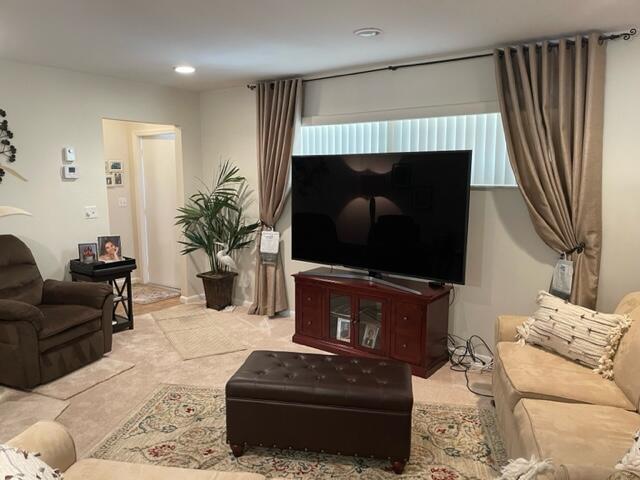22 Colonial Club Drive, Unit 103 Boynton Beach, FL 33435 - Photo 17 of 41 a living room with furniture a flat screen tv and a fireplace