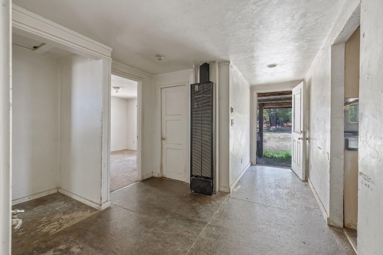 18309 Java Avenue Lemoore, CA 93245 - Photo 15 of 32 an empty room with closet and a bathroom
