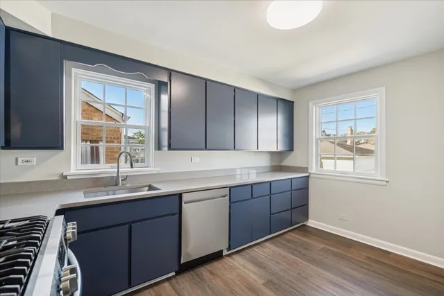 a bathroom with a sink and a window