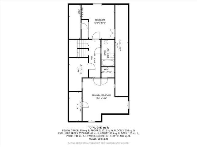 a picture of a bench in front of a wall