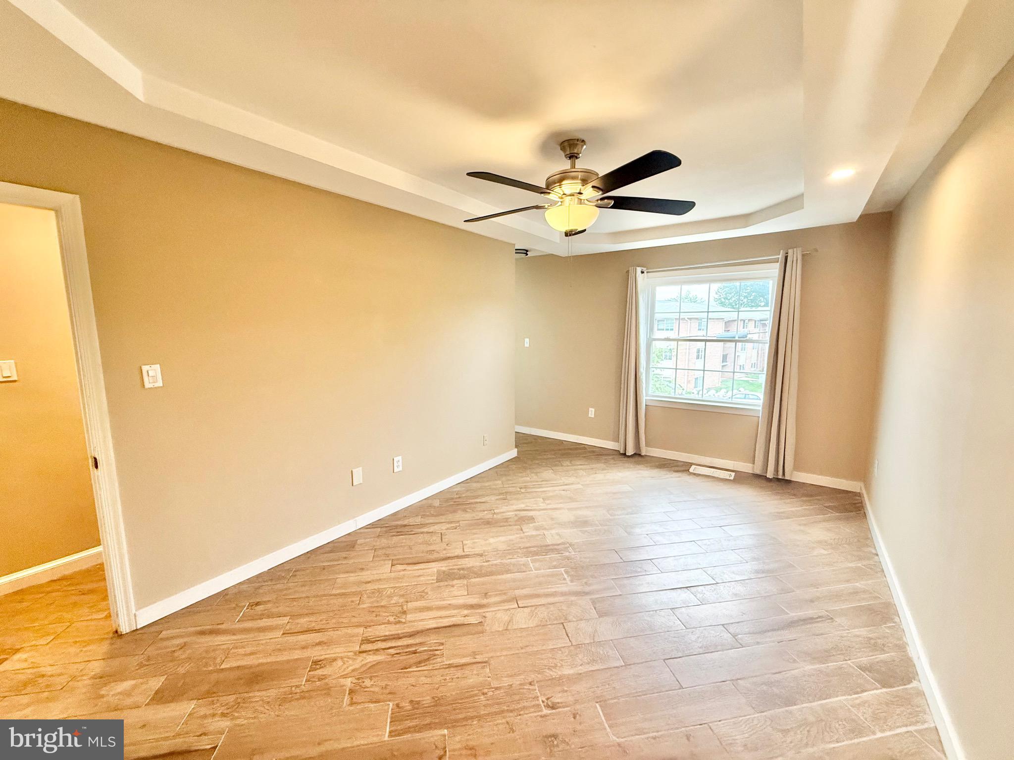 5439 Richenbacher Avenue Alexandria, VA 22304 - Photo 12 of 23 a view of an empty room with a window