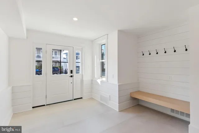 a view of a room with racks on the wall