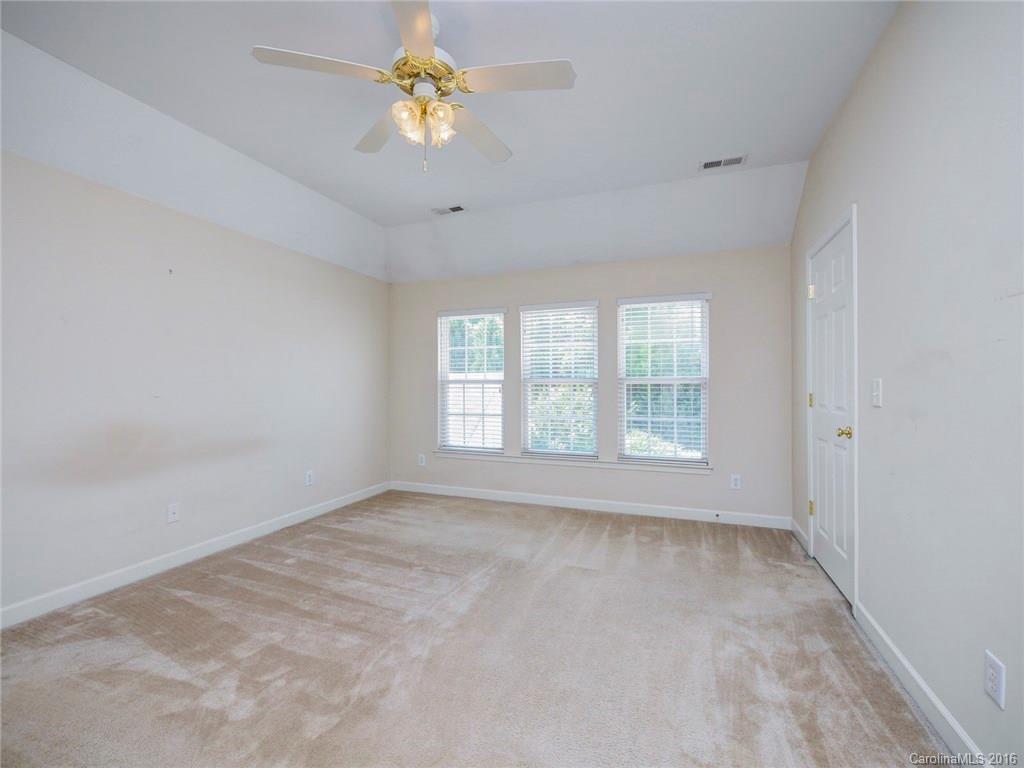 8319 Camberly Road Huntersville, NC 28078 - Photo 13 of 24 a view of an empty room with a window