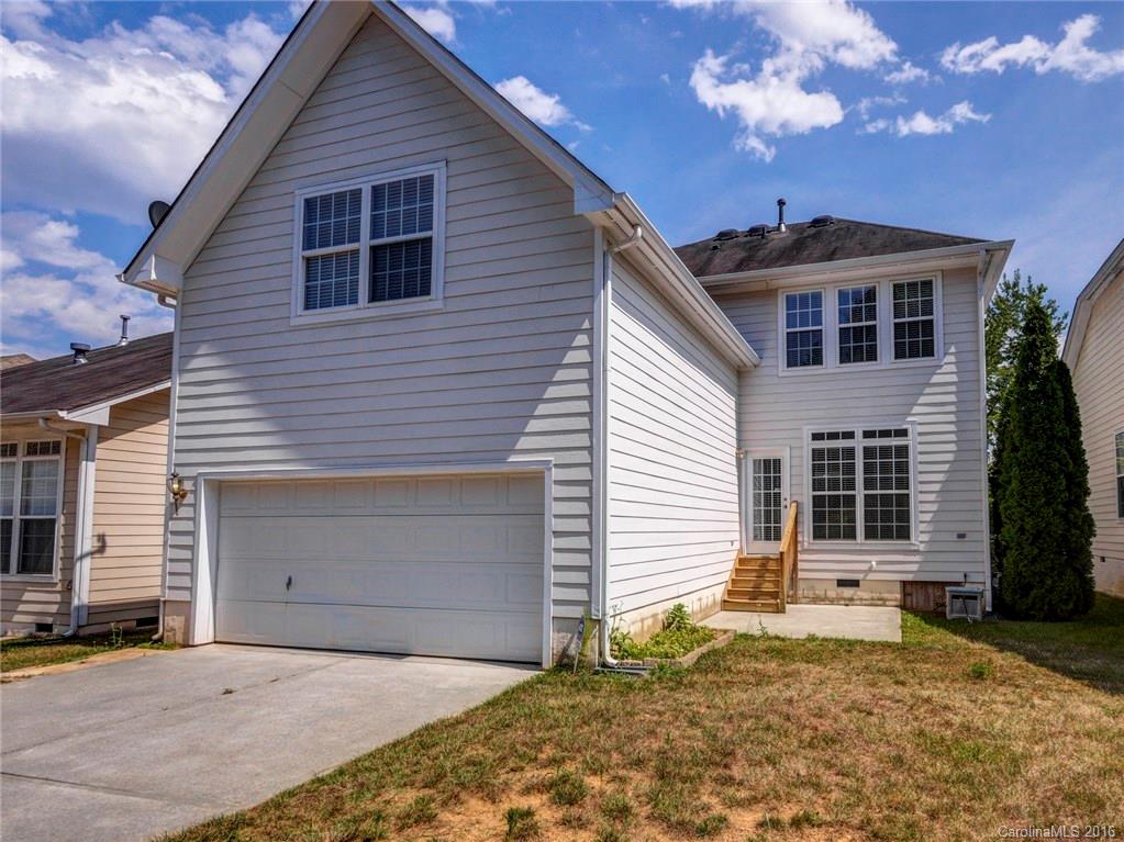 8319 Camberly Road Huntersville, NC 28078 - Photo 18 of 24 a front view of a house with a garage