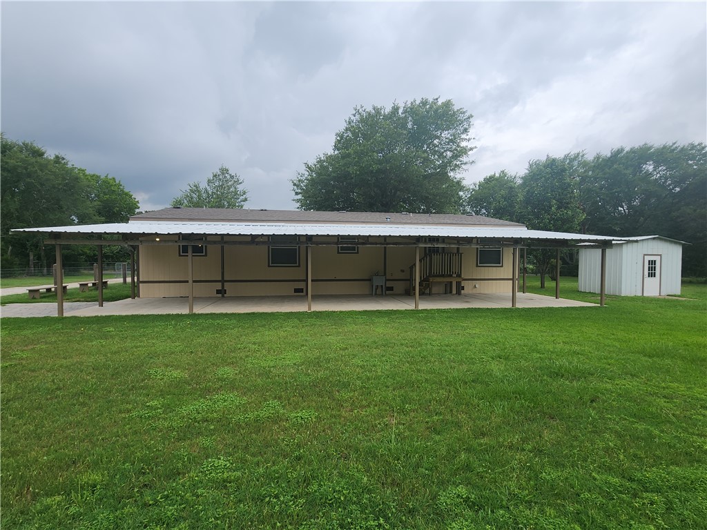 3738 Smetana Road Bryan, TX 77807 - Photo 26 of 29 a view of house with yard and entertaining space