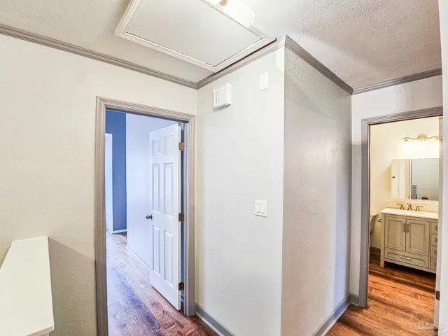 a view of a bedroom from a hallway