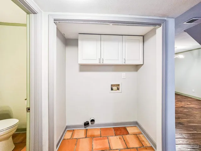 a bathroom with a toilet and a sink